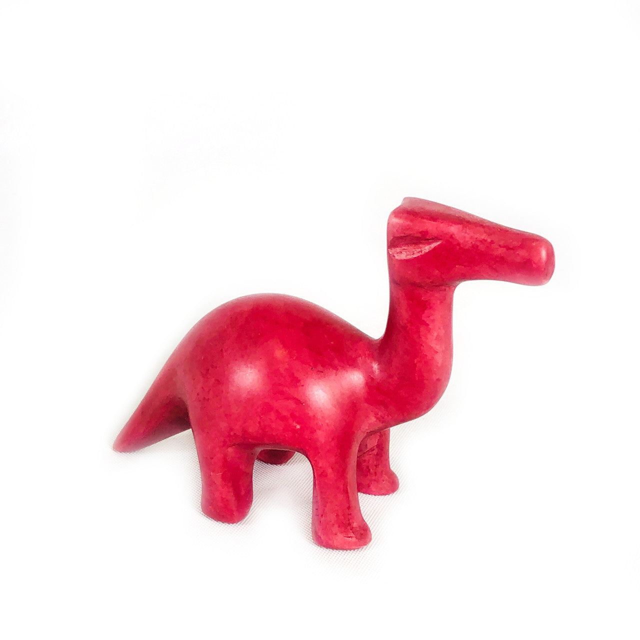 Intense dark pink soapstone dinosaur, 2 inches long