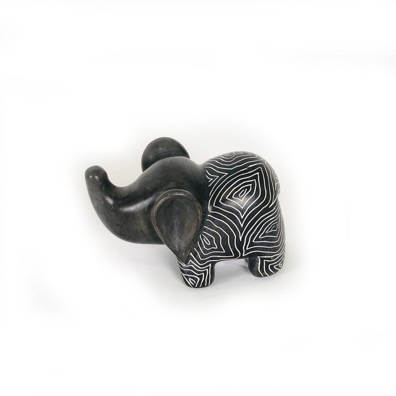 tiny elephant calf carving