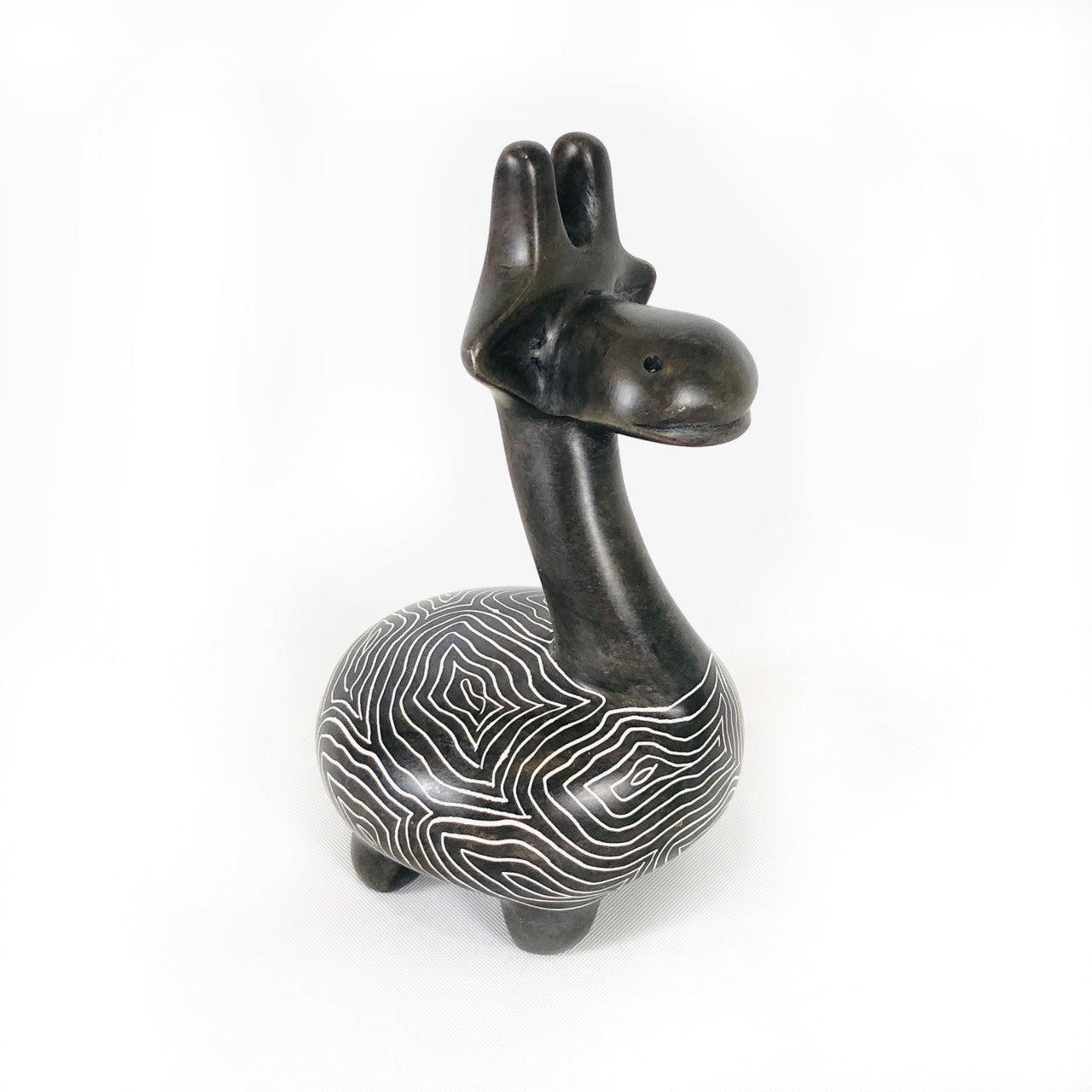 large gray giraffe hand carved in Kenya