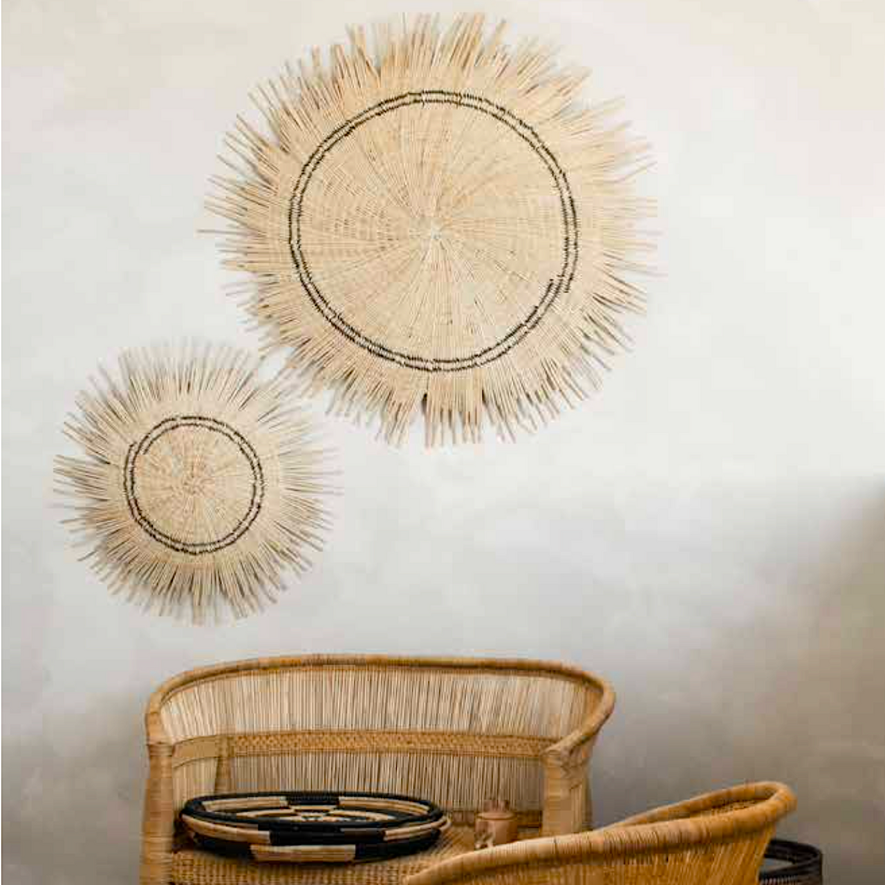 natural sun circles in two sizes hanging in a living room