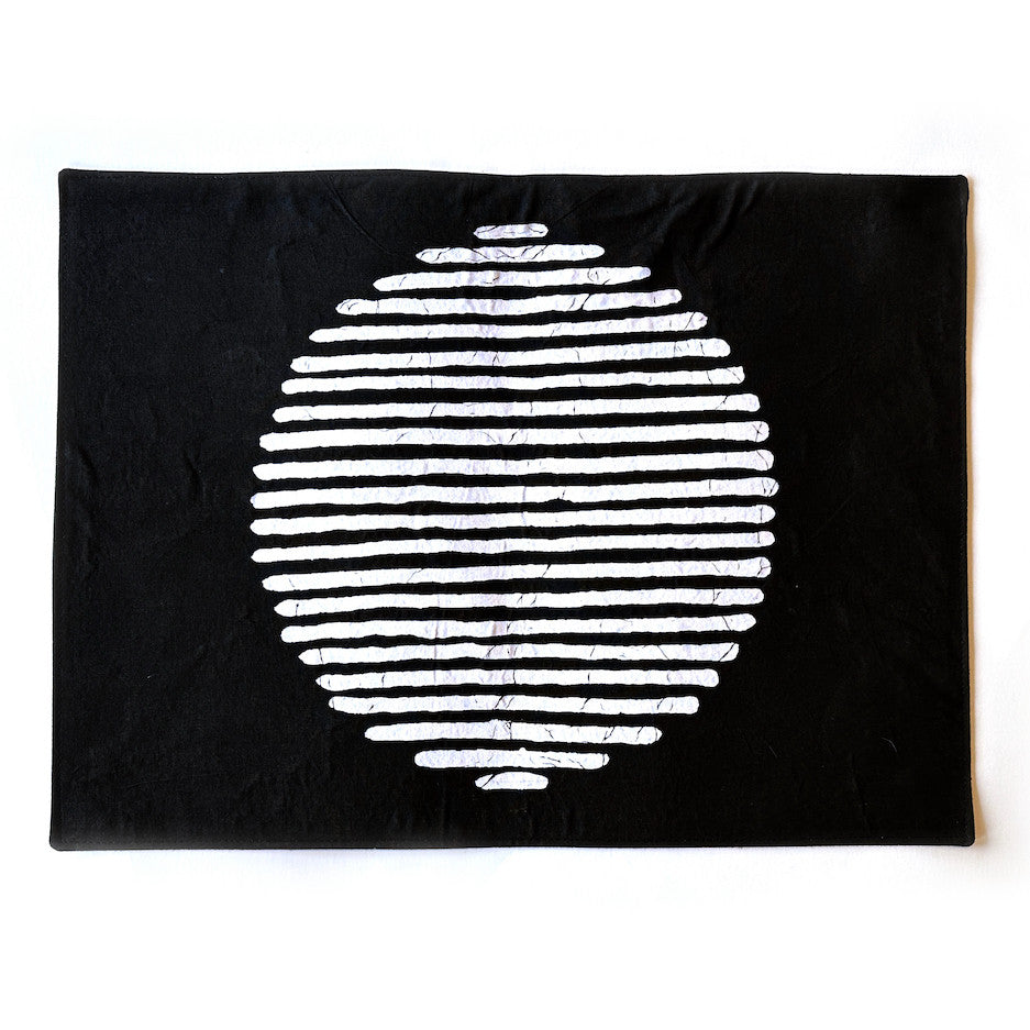 full moon black and white place mat from Zimbabwe