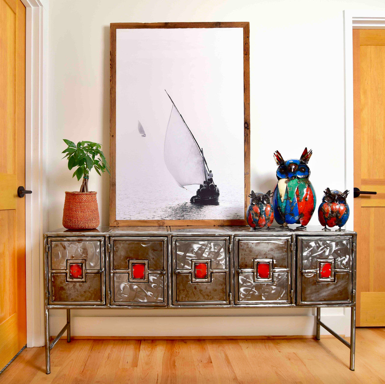 Recycled metal credenza in hallway