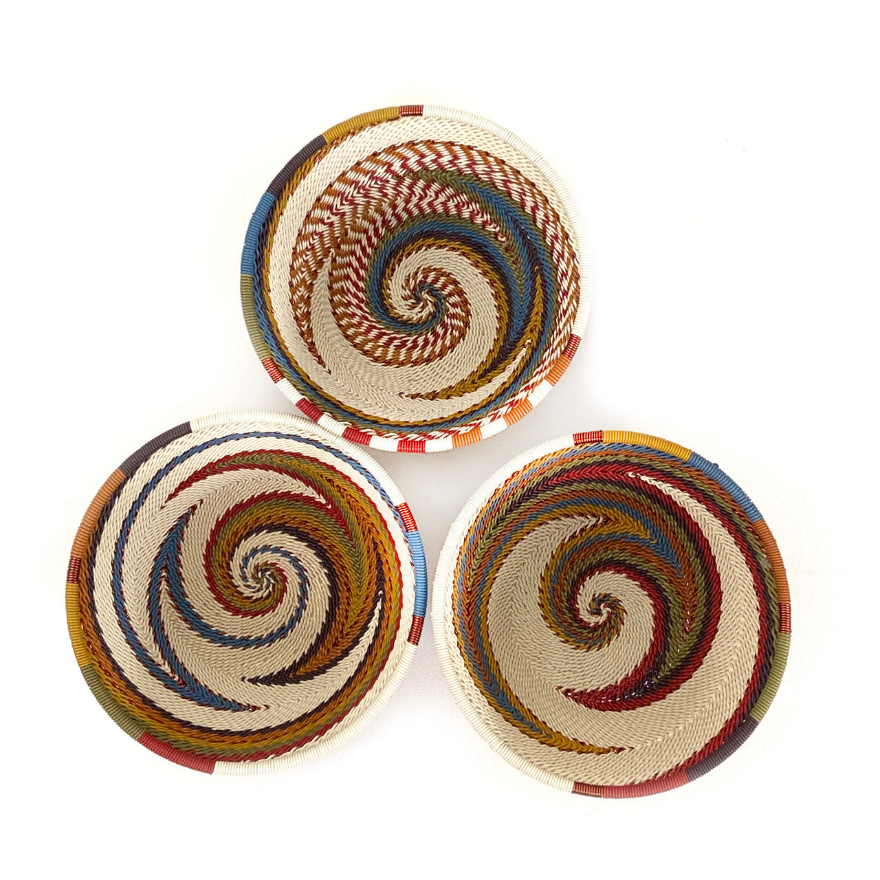 variations of pattern in copper and sand baskets, size small.