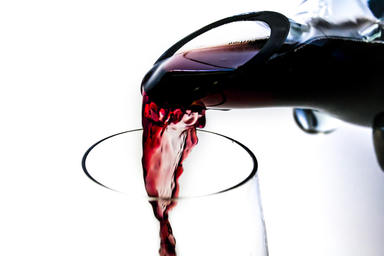 serving wine out of the recycled horn decanter