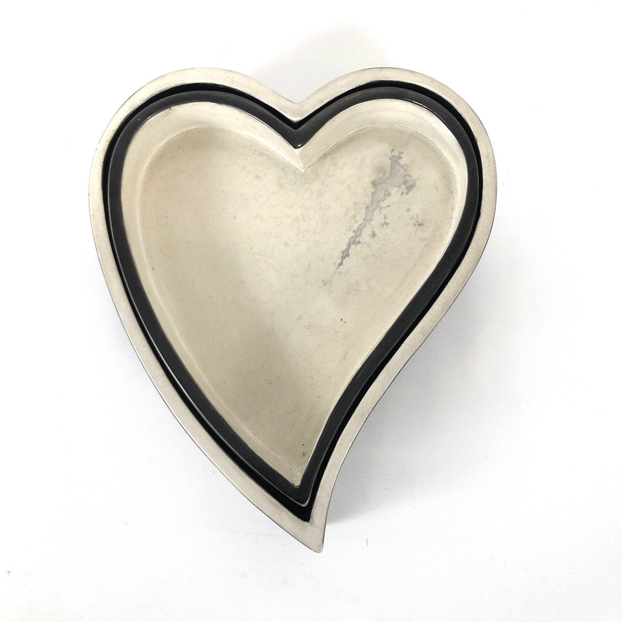 minimalist heart shaped bowls  nesting inside each other