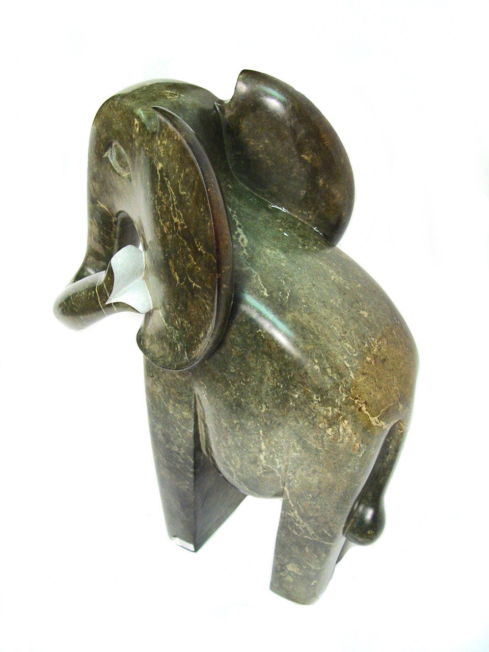 back view of green stone elephant