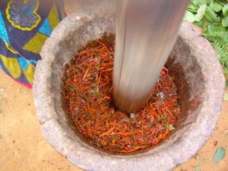 natural pigments being crushed for dying fiber
