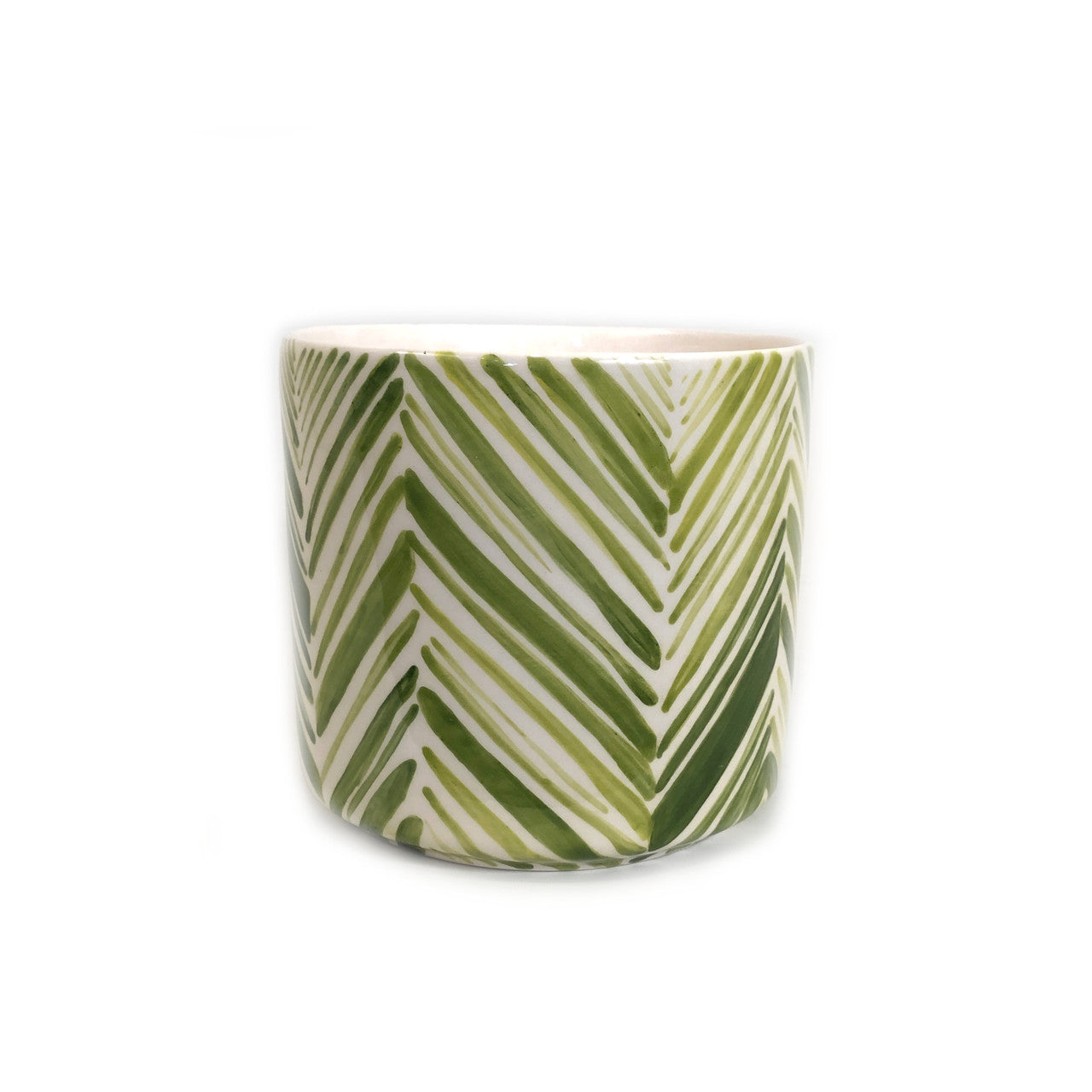 green tall ceramic bowl with leaves