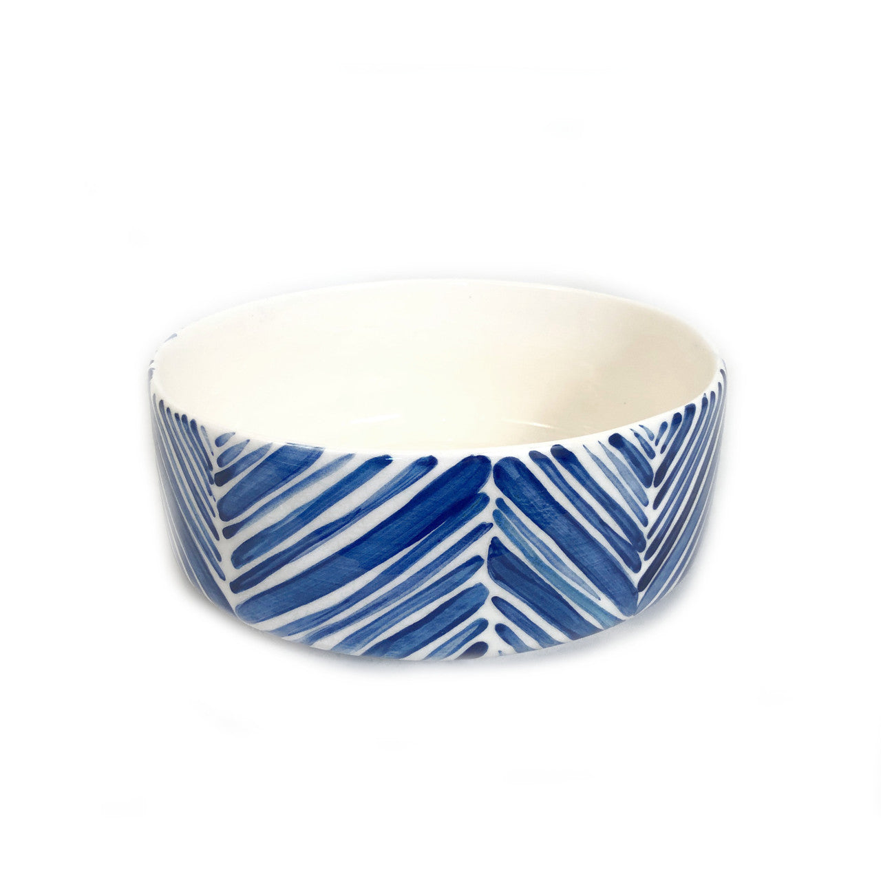 wide blue palm leaves bowl side view