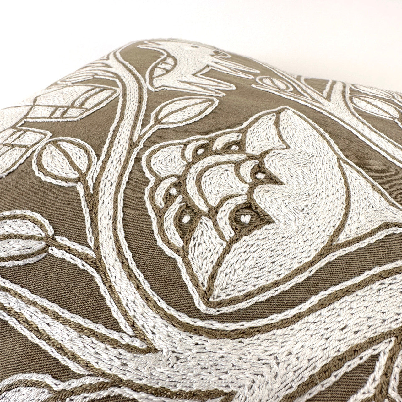 Beige and white pillow cover detail