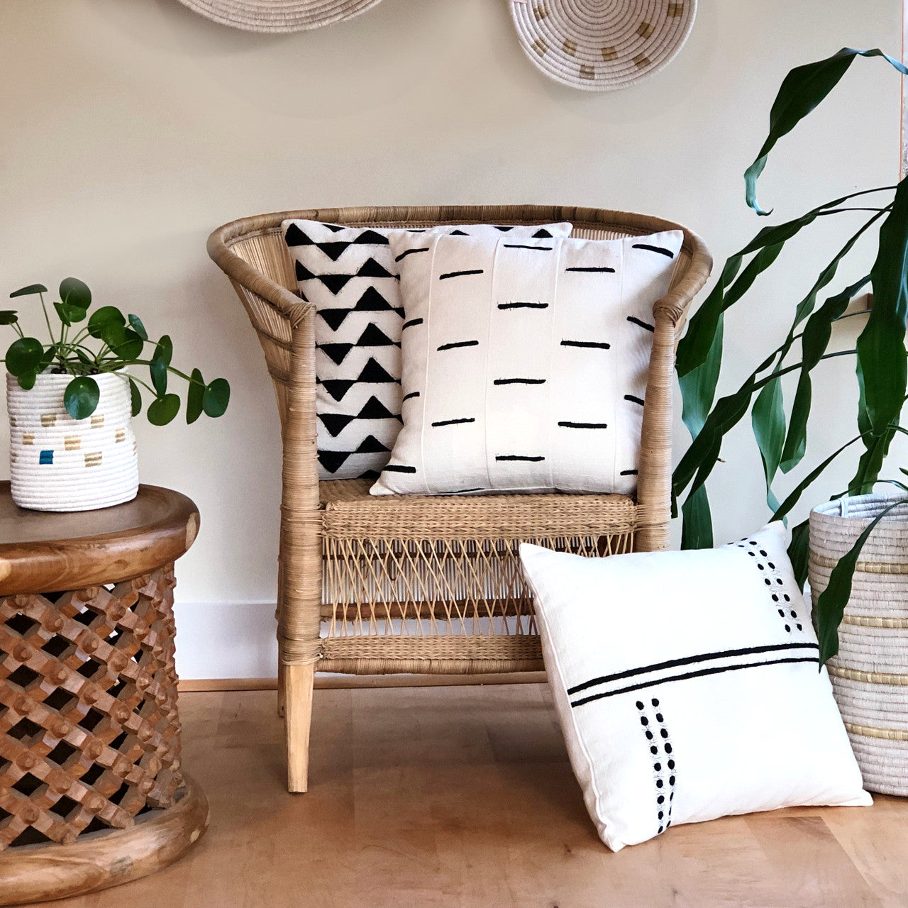triangles white pillow combined with other pillows in this collection