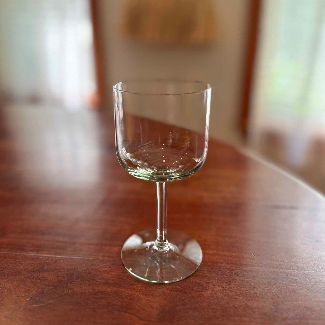 Retro wine glass on wooden table
