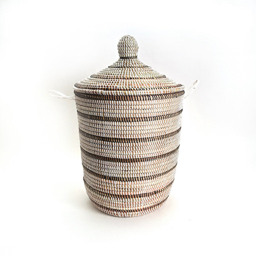 White with Black stripes basket made by women artisans in Africa