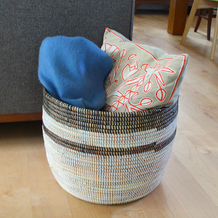 black and white stripe basket for throw pillows and blankets