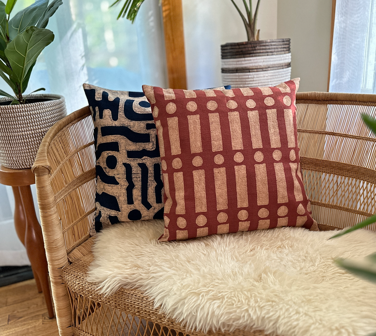 terracotta pillow combined with a blue one from this collection