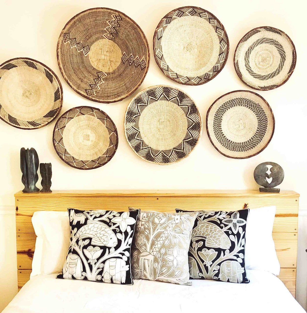 Tonga baskets on a bedroom wall