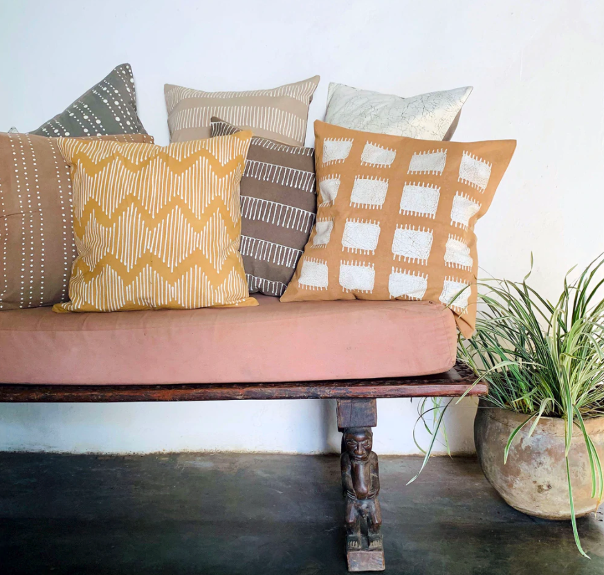 cream colored crackles pillow with earth tones pillows