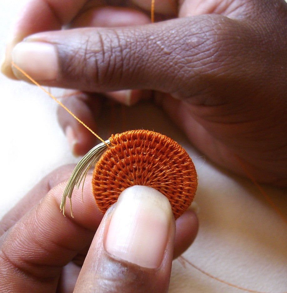 Tintsaba weaver hands close up