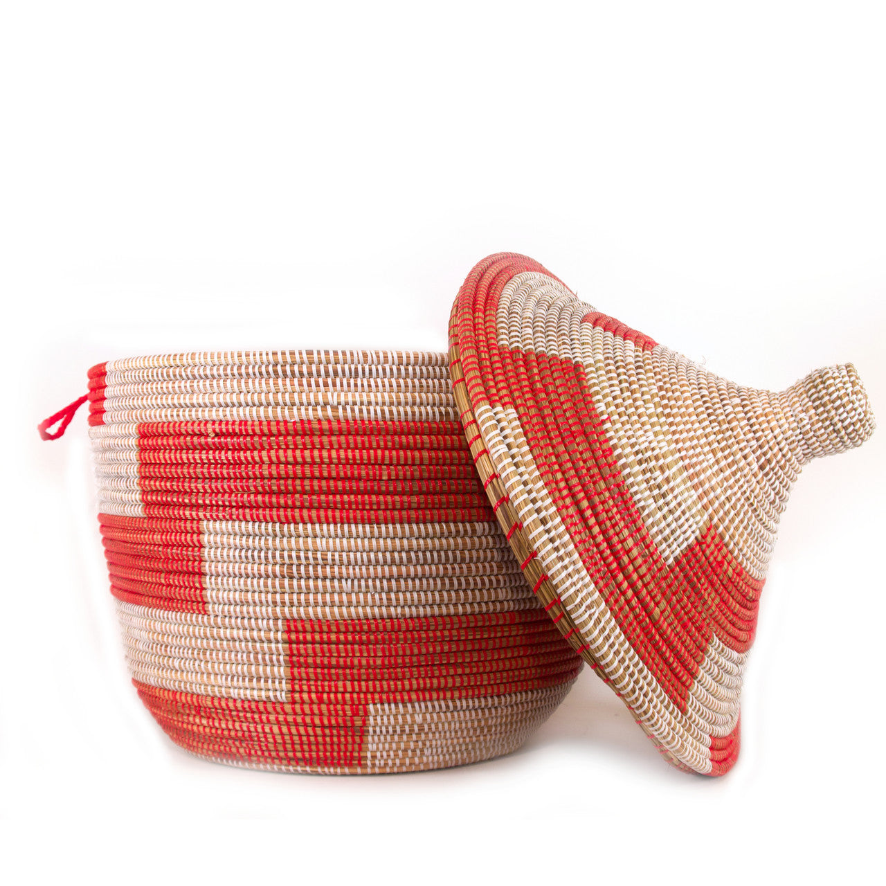 red and white striped oversize floor basket with its lid off